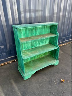Distressed wooden three shelf bookcase