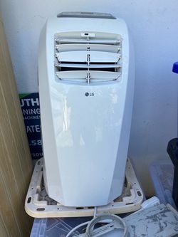 LG 10,000 BTU Air Conditioner 300 sq. ft.  for garage or a room without a/c
