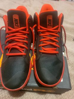 Tenis nike, size 9.5 color red &black  used.