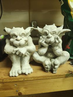 Two cute stone gargoyles