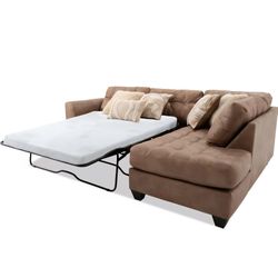 Full Size Sleeper Chaise Sectional with Pillows and Rug
