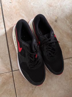 Men size 10.5 -Nike Black and Red Low-Top Sneakers