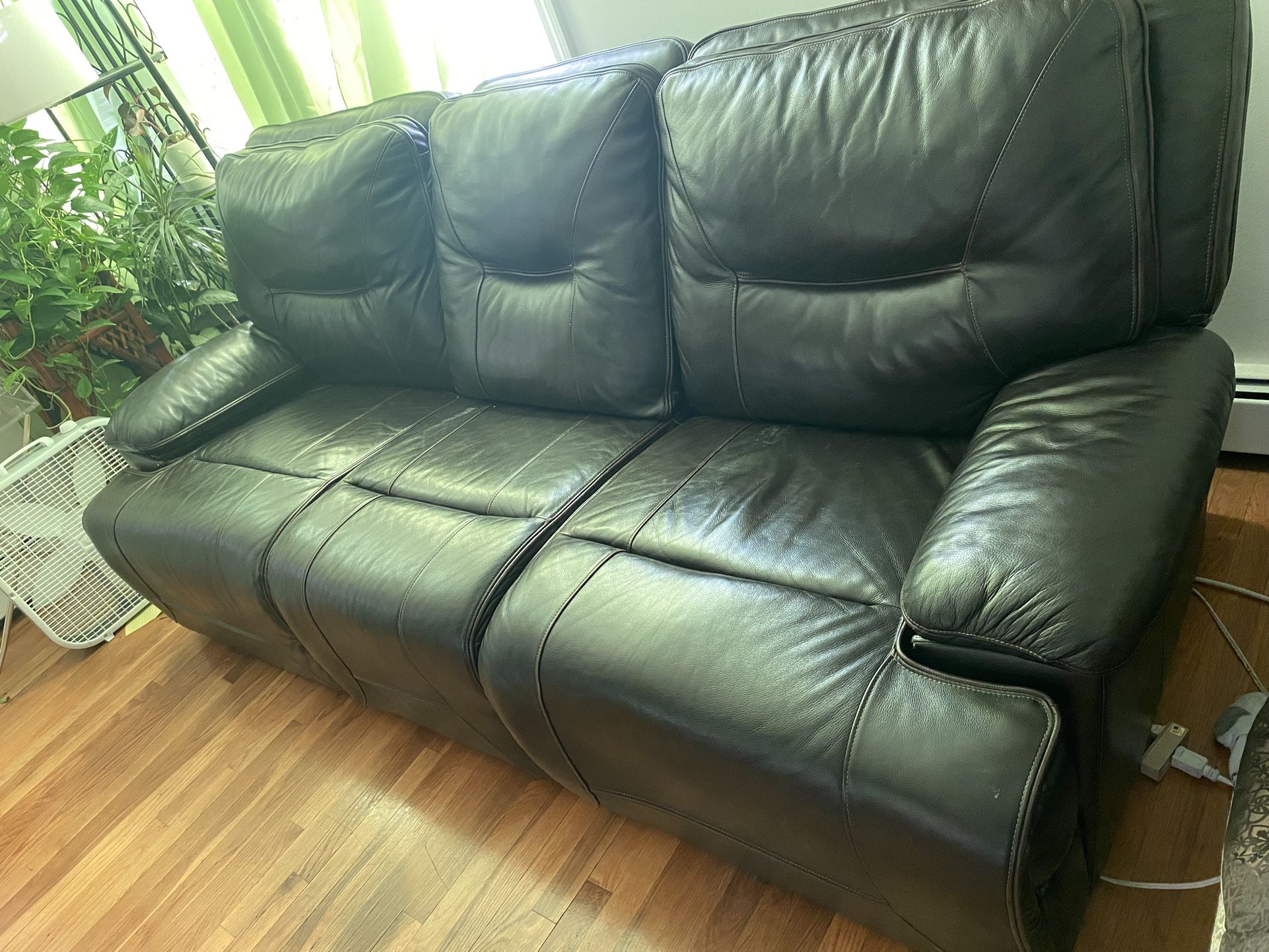 ( Used )Leather Couch Excellent Condition . USB On Both Sides And Electrical Recliner 