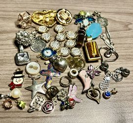 Vintage  Pendants and trinkets. These pendants and trinkets medium to small As is. No returns. What you see is what you get. Make me an offer I can’t 