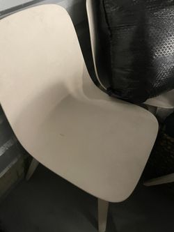 white dinner table with 4 chairs