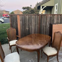 Sturdy Wood Table With 4 Chairs 2 extra Chairs have a little damage.