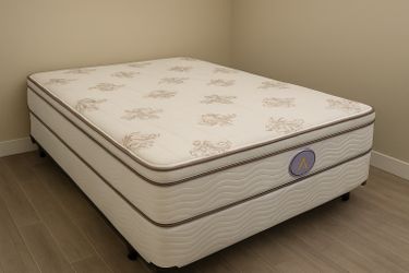 New queen mattress and box spring 2 pc bed frame is not included