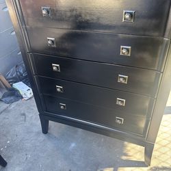 Tall black dresser
