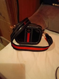 Black Crossbody Bag with Red Stripe Strap