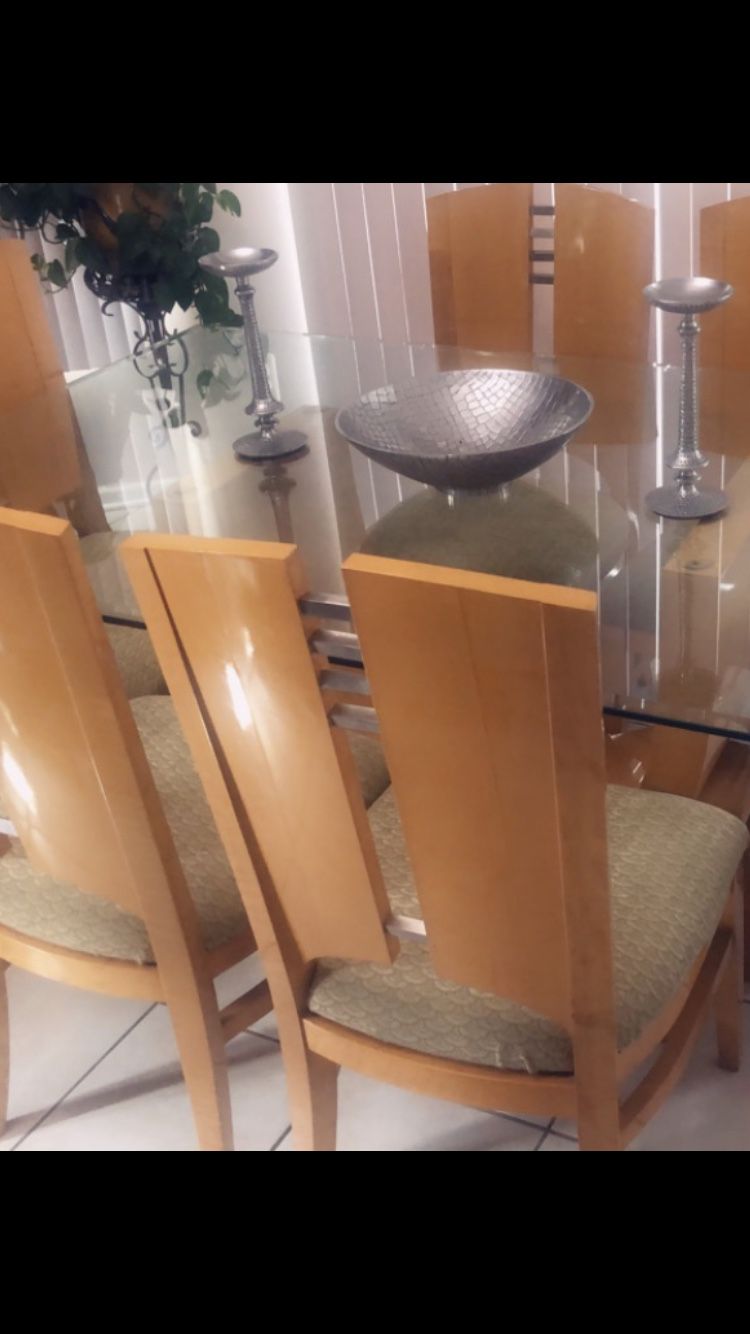 Dining set Beautiful glass dinning room with 6 chairs set. smoke free home ,measurements are 72" long by 42” excellent condition. Asking $475 OBO ma
