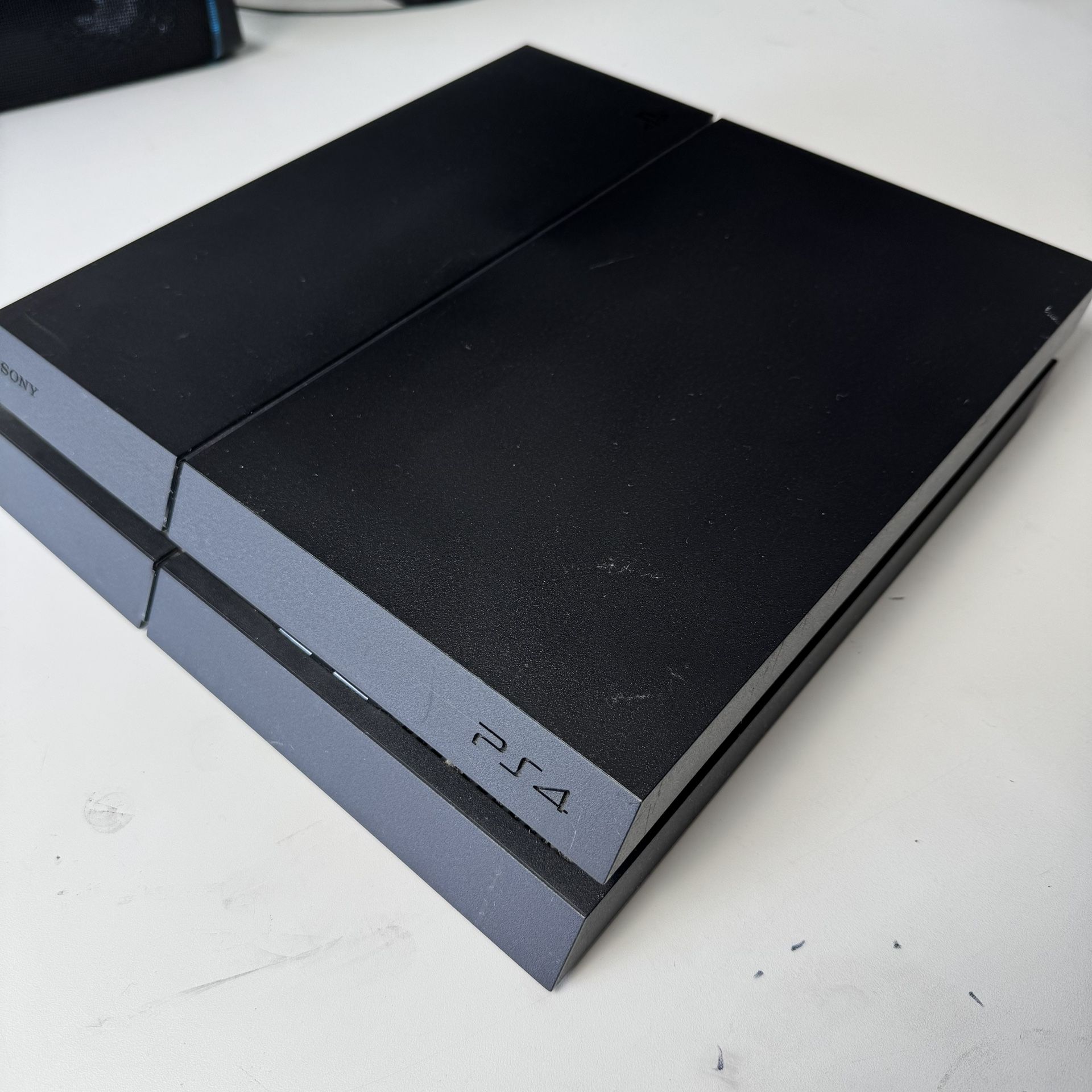 Sony PlayStation 4 Console Bundle – Great Condition!