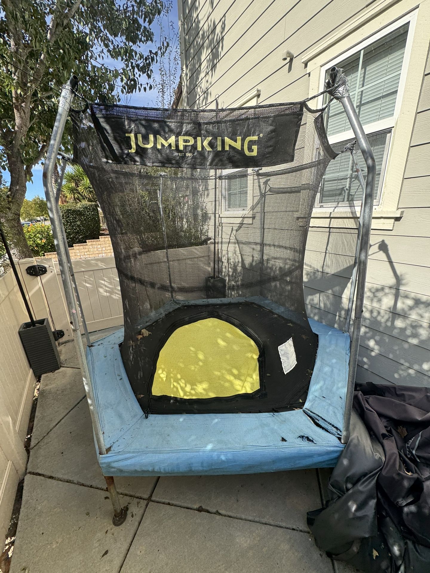 Free JumpKing trampoline for tiny patio kids and questionable life choices