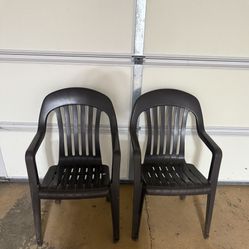 Set Of Two Brown Plastic Chairs 
