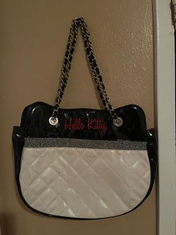 Hello kitty lounge fly purse