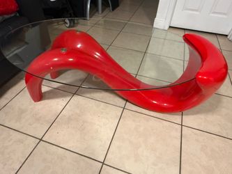 Red oval glass coffee table