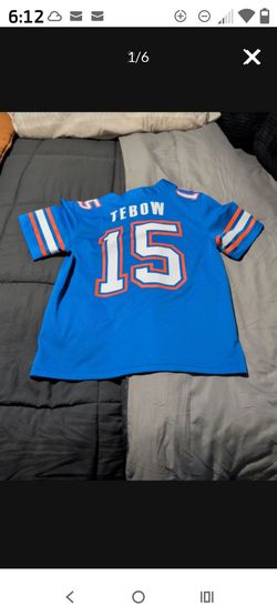 Like new Tim Tebow-  med youth