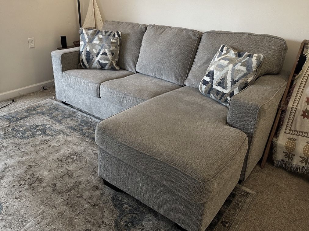 Light Gray Modern Greaves 85” Sectional Sofa with Reversible Chaise by Ashley HomeStores