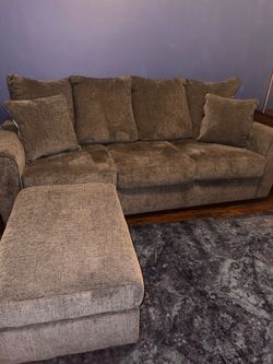 Grey couch and ottoman- like new