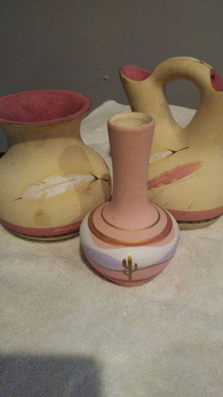 Rose feather pueblos ceramic pottery