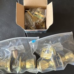 Kwikset Entry Lock, Schlage Dexter Deadbolt Lock, and Passage Lock. All Bright brass 