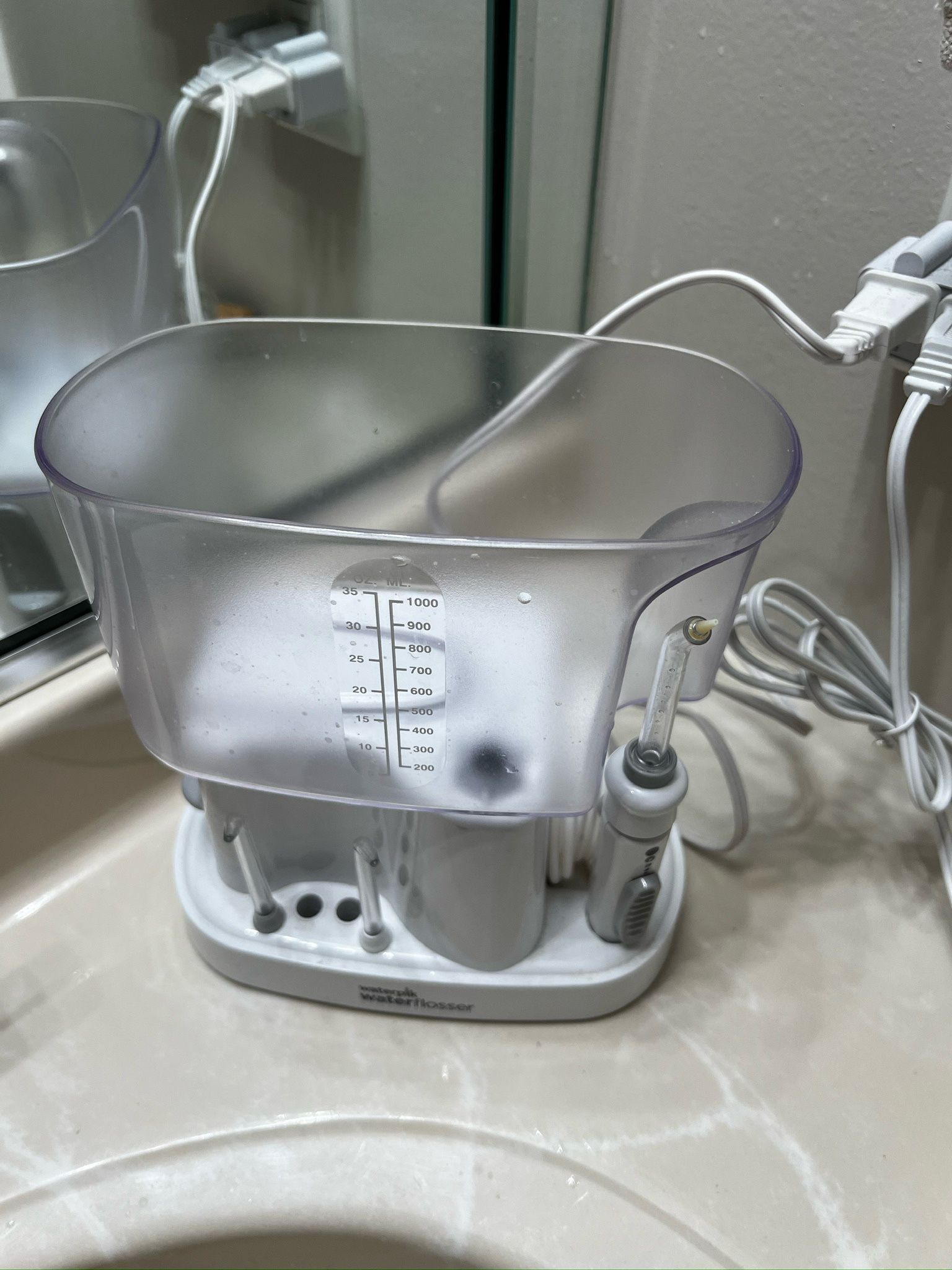 Spin Toothbrush And Water Floosner Take Both