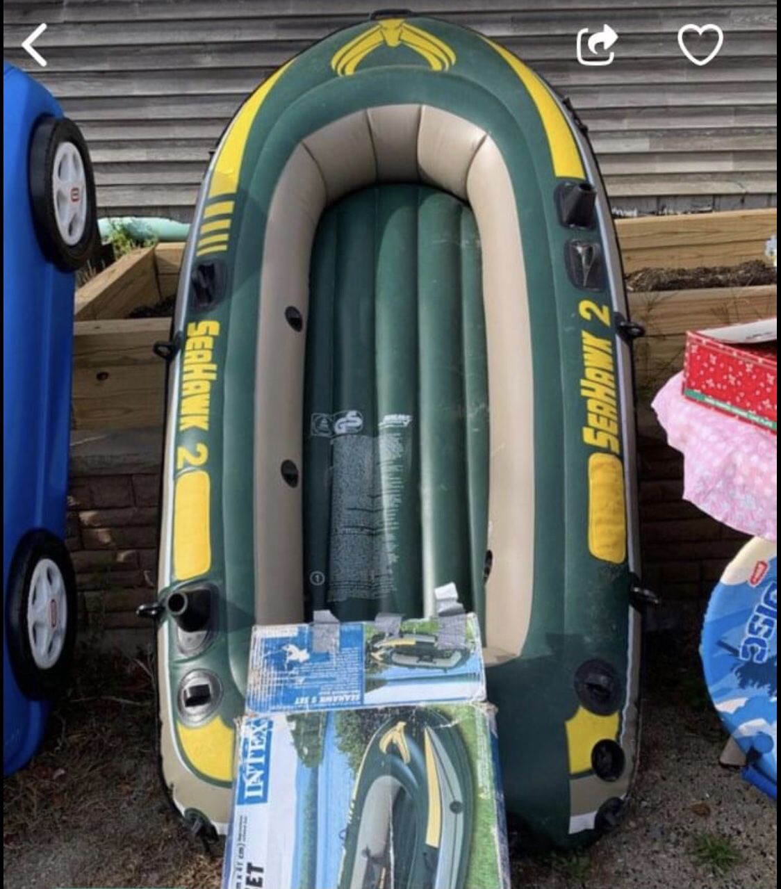 Brand new never used Inflatable boat comes with oars