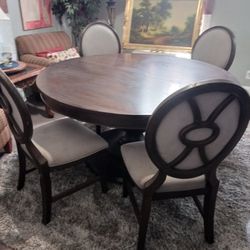Dining Table And Chairs... Delivery Available 