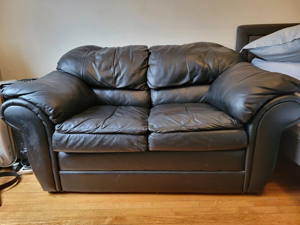 Used Black Leather Couch. (Good Condition)