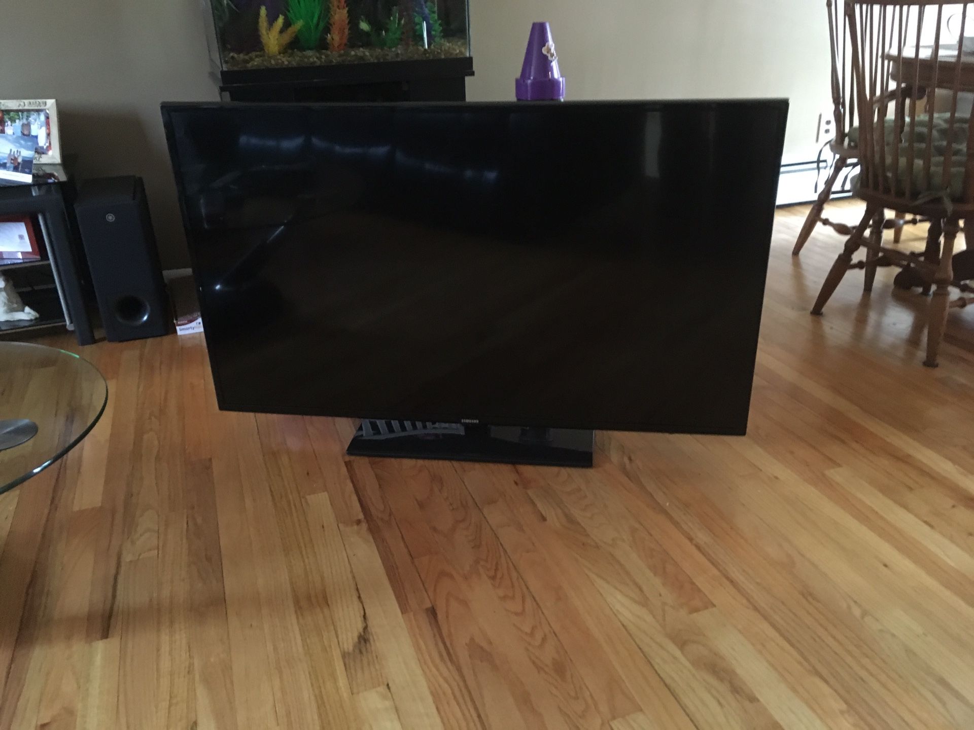 55” Samsung Smart TV with black glass stand
