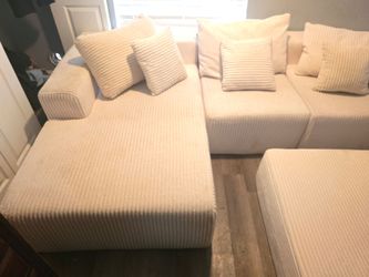 Boneless cream color sectional and chair