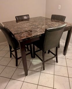 High top counter height dining table and chairs. Almost new