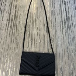Black Y S L Clutch purse 