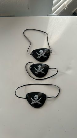 3 plastic pirate eye patches with elastic $2