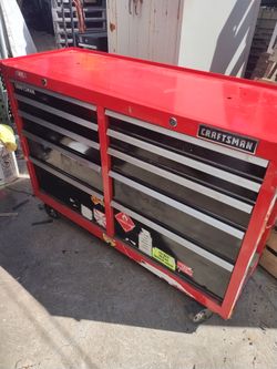 Craftsman tool box. 52"L18"D37"H. This box had lots of stickers l been removing them. Has a small dent on the back side you can see on the last 2 pic.