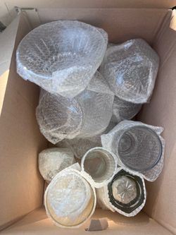 Yard sale Box of glass bowls and vases