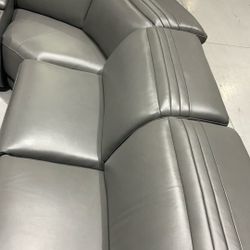 Karson Leather Power Reclining Sectional With Power Headrests