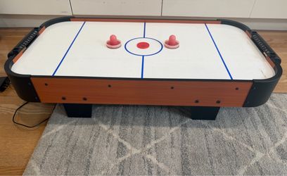 Portable table top electric ￼air hockey game