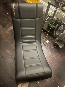 Rocker corded audio enhancing foldable gaming chair