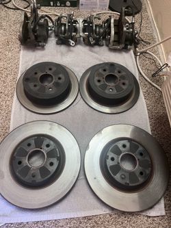 15-21 WRX OEM calipers and Rotors