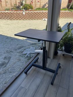 Beautiful Antique Rolling Adjustable Training Table.