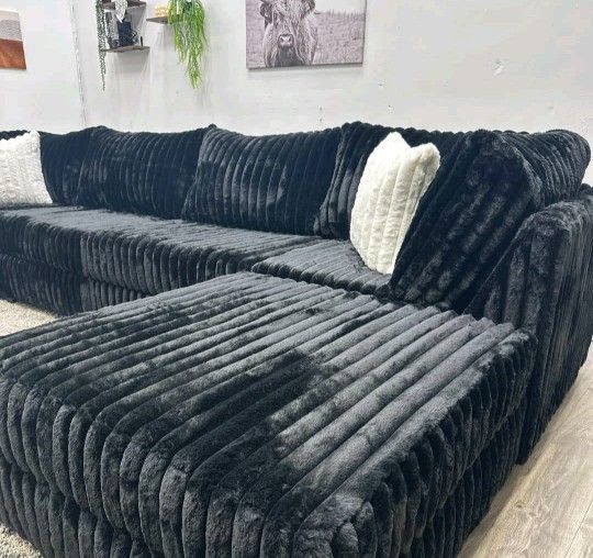 Upgrade Smooth Black Ottoman couch