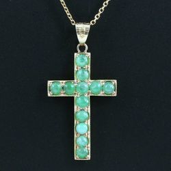 BEAUTIFUL 14 KT GOLD AND EMERALD CROSS AND CHAIN.