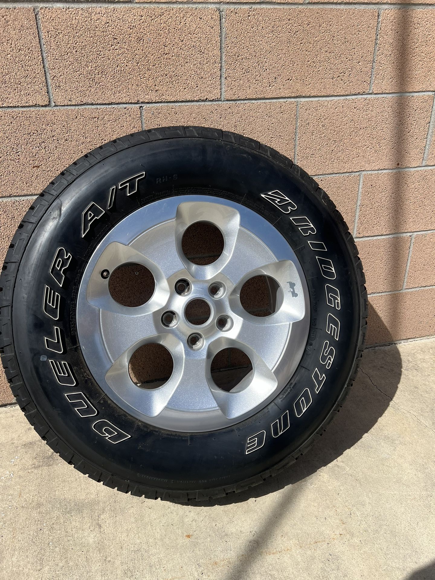 Brand New BFGoodrich Tire With New Jeep Sahara Wheel 