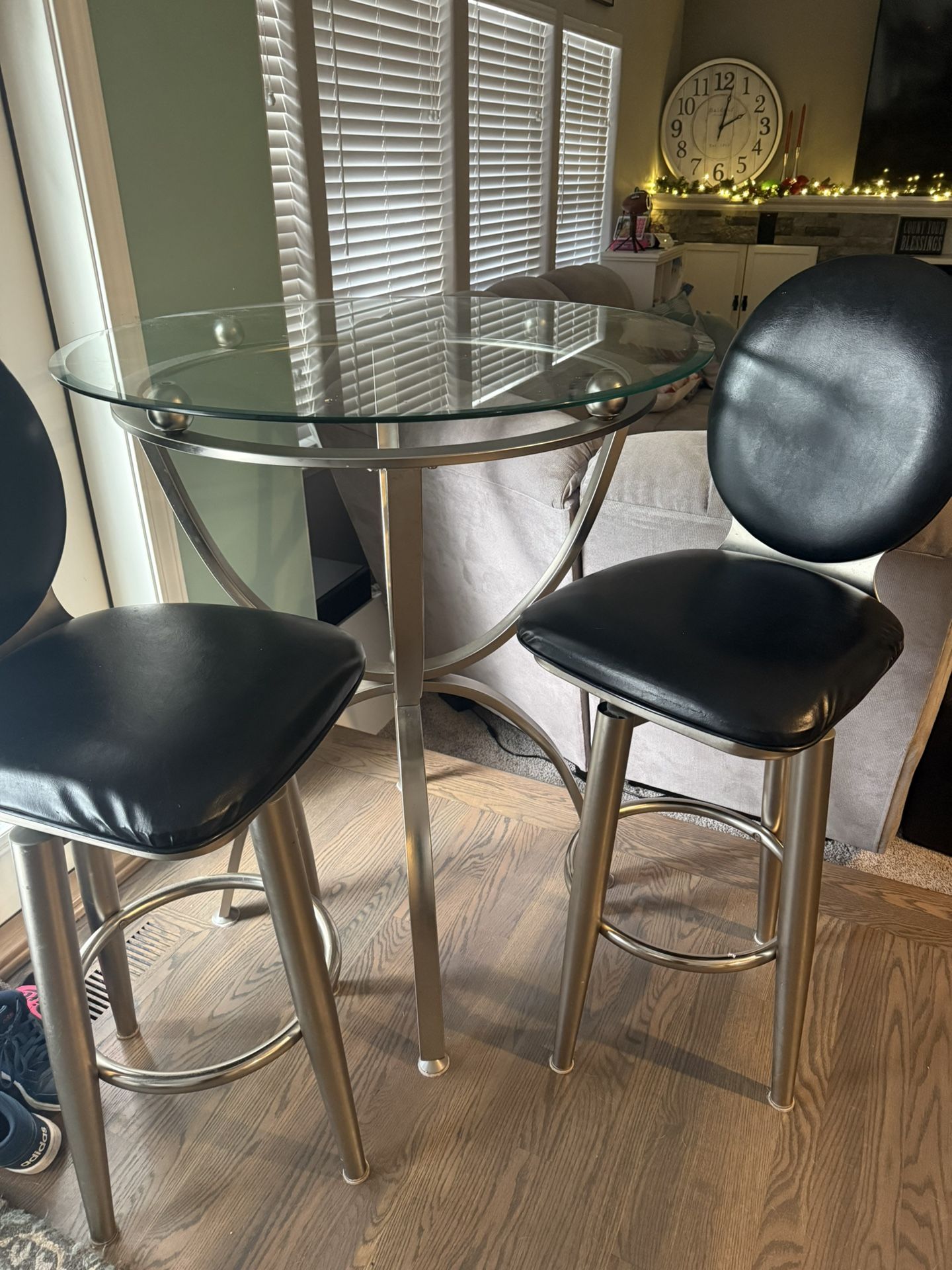 Like new glass bistro bar top 2 person table with stools.