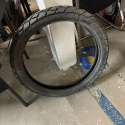 Motorcycle tire one left see pics or come check it out I don't know motorcycles so I don't know anything anything . 