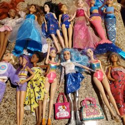 Lot of 24 barbies And Extras