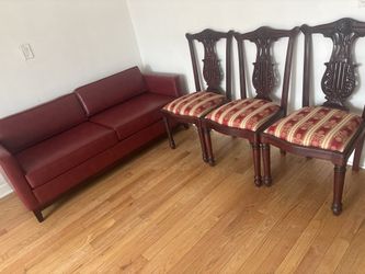 Red Leather Couch With Red Wood Chairs 