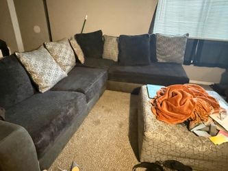 Black sectional  with ottoman