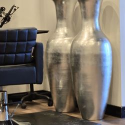 55 in tall silver vases.Light weight.large.63 inches tall
