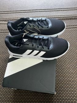 Adidas woman tennis shoes  size 9
